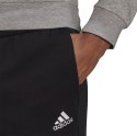 Adidas Dres męski adidas Essentials Tracksuit szaro-czarny GK9653