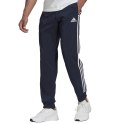 Adidas Spodnie męskie adidas Essentials Tapered Cuff 3 Stripes Pants granatowe GK8981 Adidas Spodnie męskie adidas Essentials Tapered Cuff 3 Stripes Pants granatowe GK8981