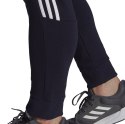 Adidas Spodnie męskie adidas Essentials Tapered Cuff 3 Stripes granatowe GK8977 Adidas Spodnie męskie adidas Essentials Tapered Cuff 3 Stripes granatowe GK8977