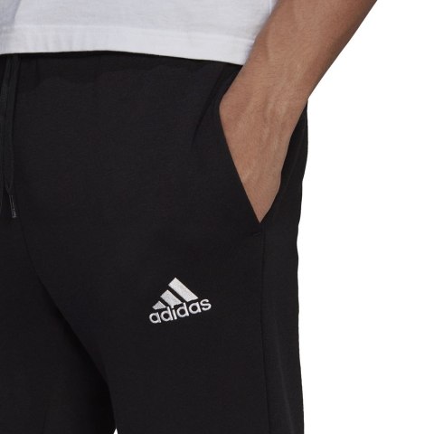 Adidas Spodnie męskie adidas Essentials Tapered Cuff Pants czarne GK9268 Adidas Spodnie męskie adidas Essentials Tapered Cuff Pants czarne GK9268
