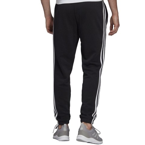 Adidas Spodnie męskie adidas Essentials Tapered Elasticcuff 3 Stripes Pant czarne GK8829 Adidas Spodnie męskie adidas Essentials Tapered Elasticcuff 3 Stripes Pant czarne GK8829