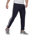 Adidas Spodnie męskie adidas Essentials Tapered Elastic Cuff 3 Stripes Pant granatowe GK8830 Adidas Spodnie męskie adidas Essentials Tapered Elastic Cuff 3 Stripes Pant granatowe GK8830