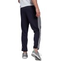 Adidas Spodnie męskie adidas Essentials Tapered Elastic Cuff 3 Stripes Pant granatowe GK8830 Adidas Spodnie męskie adidas Essentials Tapered Elastic Cuff 3 Stripes Pant granatowe GK8830