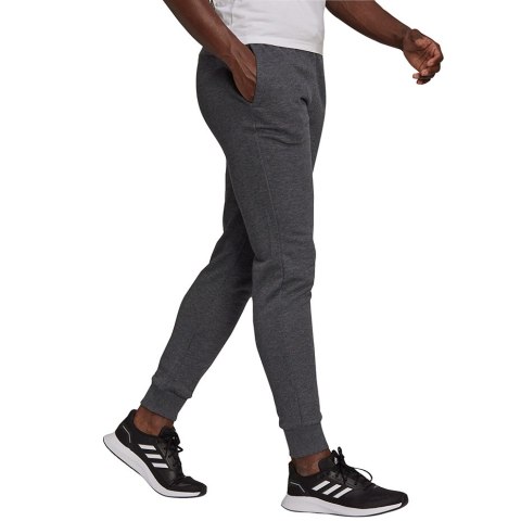 Adidas Spodnie damskie adidas Essentials Slim Tapered Cuffed Pant ciemnoszare HA0265 Adidas Spodnie damskie adidas Essentials Slim Tapered Cuffed Pant ciemnoszare HA0265