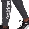 Adidas Spodnie damskie adidas Essentials Slim Tapered Cuffed Pant ciemnoszare HA0265 Adidas Spodnie damskie adidas Essentials Slim Tapered Cuffed Pant ciemnoszare HA0265