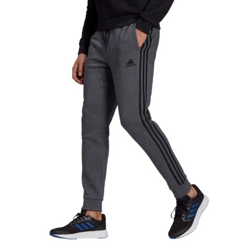Adidas Spodnie męskie adidas Essentials Tapered Cuff 3 Stripes ciemnoszare GK8826 Adidas Spodnie męskie adidas Essentials Tapered Cuff 3 Stripes ciemnoszare GK8826