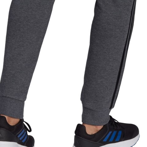 Adidas Spodnie męskie adidas Essentials Tapered Cuff 3 Stripes ciemnoszare GK8826 Adidas Spodnie męskie adidas Essentials Tapered Cuff 3 Stripes ciemnoszare GK8826