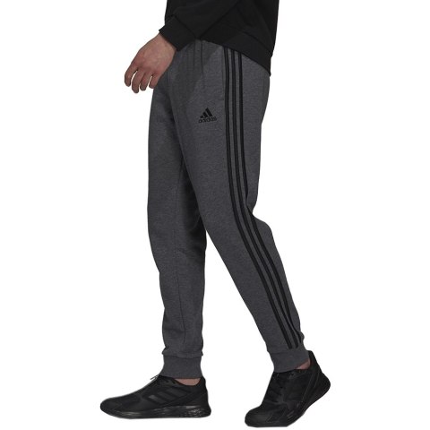 Adidas Spodnie męskie adidas Essentials French Terry Tapered Cuff 3-Stripes Pants szare H12256 Adidas Spodnie męskie adidas Essentials French Terry Tapered Cuff 3-Stripes Pants szare H12256
