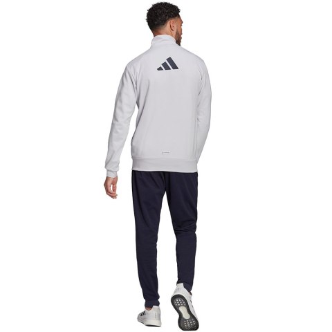 Adidas Dres męski adidas Logo Graphic Track Suit szaro-granatowy H61134 Adidas Dres męski adidas Logo Graphic Track Suit szaro-granatowy H61134