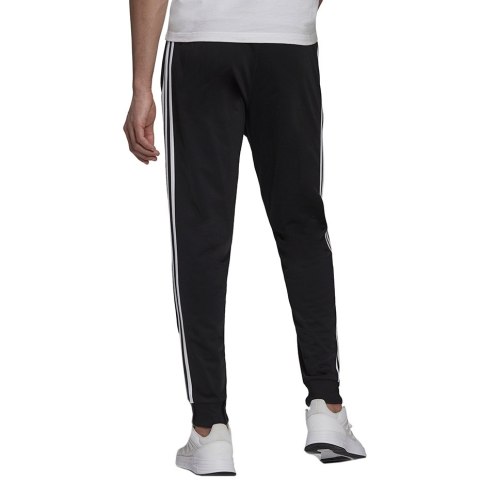 Adidas Spodnie męskie adidas Primegreen Essentials Warm-Up Tapered 3-Stripes Track czarne H46105 Adidas Spodnie męskie adidas Primegreen Essentials Warm-Up Tapered 3-Stripes Track czarne H46105