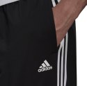 Adidas Spodnie męskie adidas Primegreen Essentials Warm-Up Tapered 3-Stripes Track czarne H46105