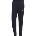 Adidas Spodnie męskie adidas Essentials Colorblock Fleece granatowe HK2884