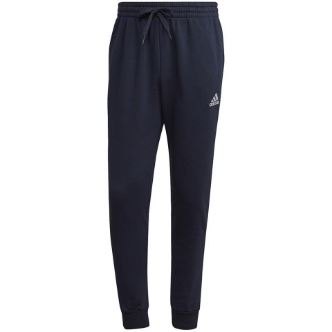 Adidas Spodnie męskie adidas Essentials Fleece Regular Tapered granatowe HL2231