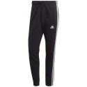 Adidas Spodnie męskie adidas Essentials French Terry Tapered Cuff 3-Stripes czarne IC0050