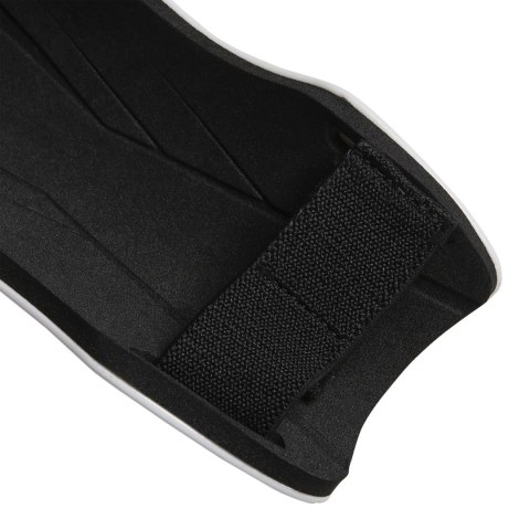 Adidas teamwear Ochraniacze piłkarskie adidas Tiro Training SG biało-czarne HN5605 Adidas teamwear Ochraniacze piłkarskie adidas Tiro Training SG biało-czarne HN5605