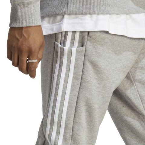 Adidas Spodnie męskie adidas Essentials French Terry Tapered Cuff 3-Stripes szare IC9407 Adidas Spodnie męskie adidas Essentials French Terry Tapered Cuff 3-Stripes szare IC9407