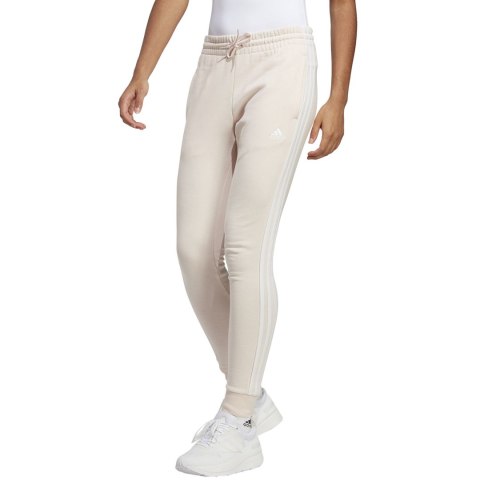 Adidas Spodnie damskie adidas Essentials 3-Stripes French Terry Cuffed kremowe IC9924 Adidas Spodnie damskie adidas Essentials 3-Stripes French Terry Cuffed kremowe IC9924