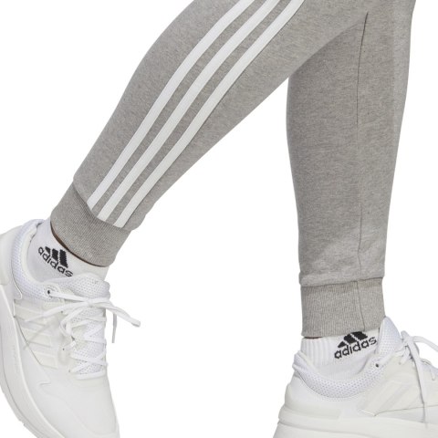 Adidas Spodnie damskie adidas Essentials 3-Stripes French Terry Cuffed szare IC9922 Adidas Spodnie damskie adidas Essentials 3-Stripes French Terry Cuffed szare IC9922