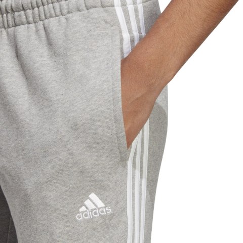 Adidas Spodnie damskie adidas Essentials 3-Stripes French Terry Cuffed szare IC9922 Adidas Spodnie damskie adidas Essentials 3-Stripes French Terry Cuffed szare IC9922
