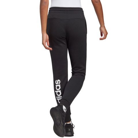 Adidas Spodnie damskie adidas Essentials Linear French Terry Cuffed czarne IC6868 Adidas Spodnie damskie adidas Essentials Linear French Terry Cuffed czarne IC6868