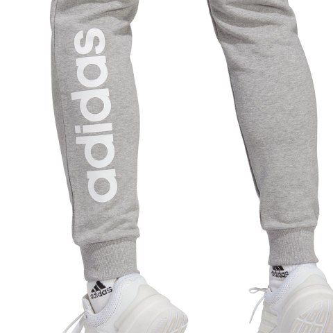 Adidas Spodnie damskie adidas Essentials Linear French Terry Cuffed szare IC8816 Adidas Spodnie damskie adidas Essentials Linear French Terry Cuffed szare IC8816