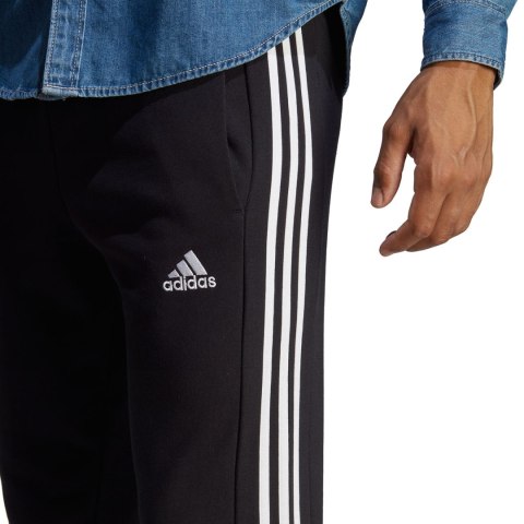 Adidas Spodnie męskie adidas Essentials French Terry Tapered Cuff 3-Stripes czarne HA4337 Adidas Spodnie męskie adidas Essentials French Terry Tapered Cuff 3-Stripes czarne HA4337