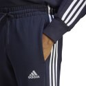 Adidas Spodnie męskie adidas Essentials French Terry Tapered Cuff 3-Stripes granatowe IC9406