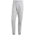 Adidas Spodnie męskie adidas Essentials Fleece 3-Stripes Tapered Cuff szare IJ6494