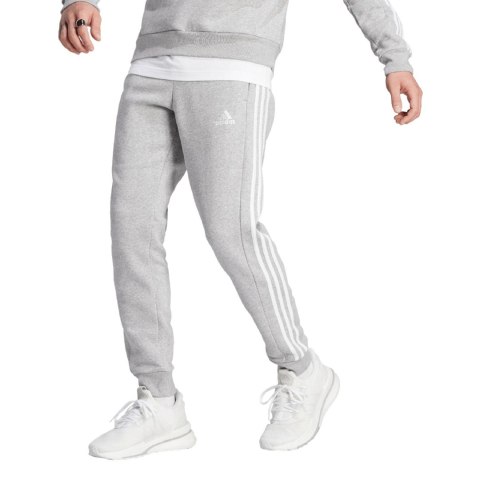 Adidas Spodnie męskie adidas Essentials Fleece 3-Stripes Tapered Cuff szare IJ6494 Adidas Spodnie męskie adidas Essentials Fleece 3-Stripes Tapered Cuff szare IJ6494