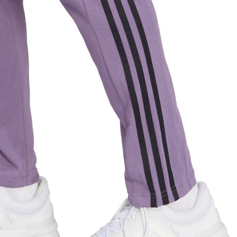 Adidas Spodnie męskie adidas Essentials Single Jersey Tapered Open Hem 3-Stripes fioletowe IJ8699 Adidas Spodnie męskie adidas Essentials Single Jersey Tapered Open Hem 3-Stripes fioletowe IJ8699