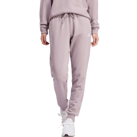 Adidas Spodnie damskie adidas Essentials Linear French Terry Cuffed fioletowe IS2105 Adidas Spodnie damskie adidas Essentials Linear French Terry Cuffed fioletowe IS2105