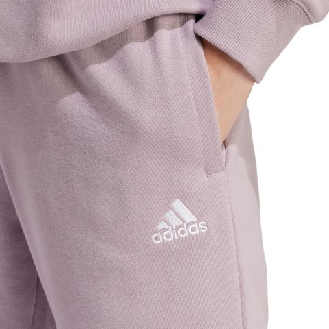 Adidas Spodnie damskie adidas Essentials Linear French Terry Cuffed fioletowe IS2105 Adidas Spodnie damskie adidas Essentials Linear French Terry Cuffed fioletowe IS2105