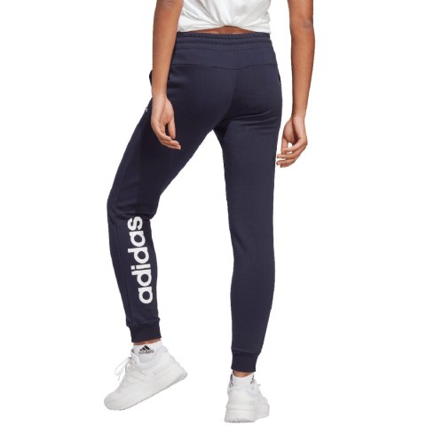 Adidas Spodnie damskie adidas Essentials Linear French Terry Cuffed granatowe IC6869 Adidas Spodnie damskie adidas Essentials Linear French Terry Cuffed granatowe IC6869