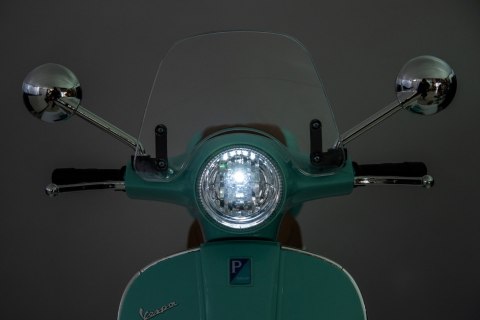 Jeździk akumulatorowy Scooter Vespa z kuferkiem turkusowy Jeździk akumulatorowy Scooter Vespa z kuferkiem turkusowy